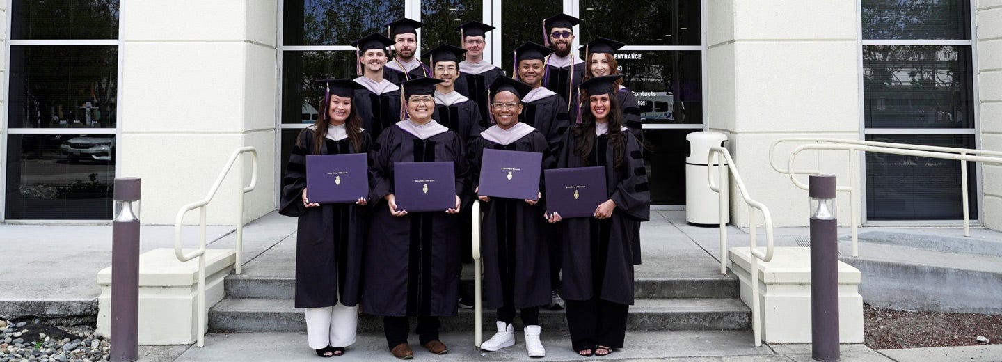 West Class 170 in graduation caps and gowns.