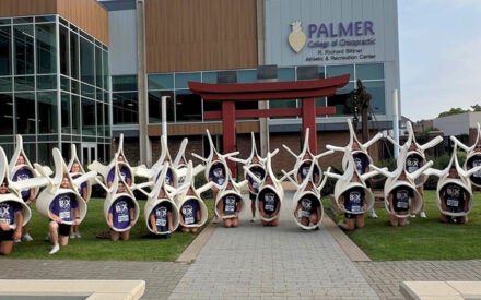 Students dressed in spine costumes in Bix parade.