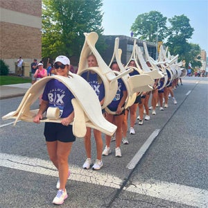 Students dressed in spine costumes in Bix parade.