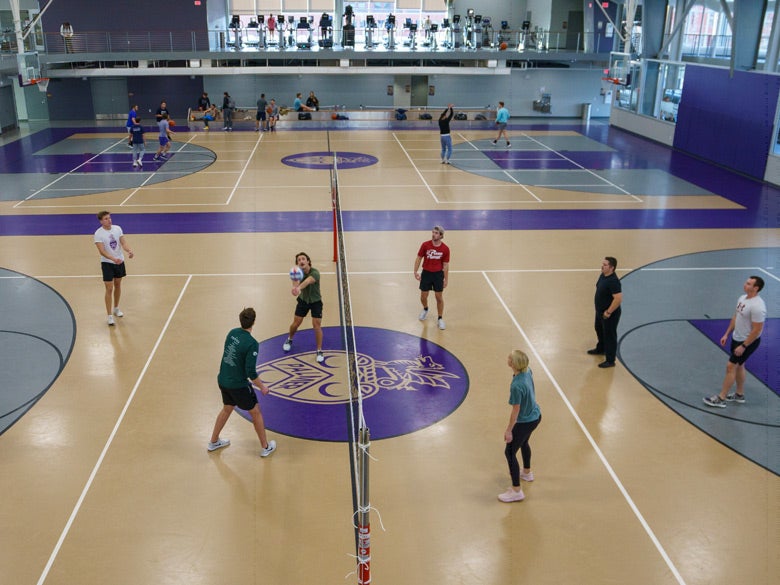 Volleyball players on the Bittner Center court.