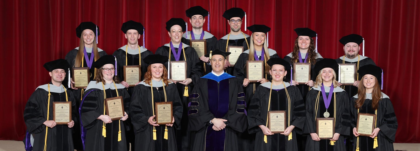 Main Campus graduates with awards.